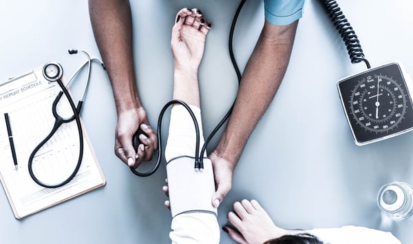 doctor_taking_persons_puls