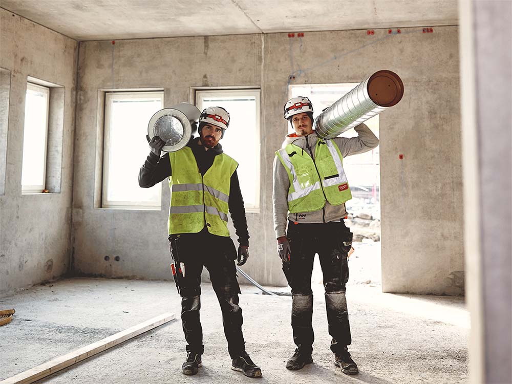 two-men-at-construction-site-working
