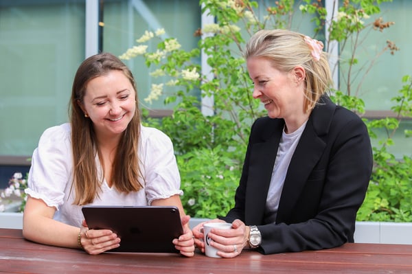 two-persons-in-a-meeting-outside