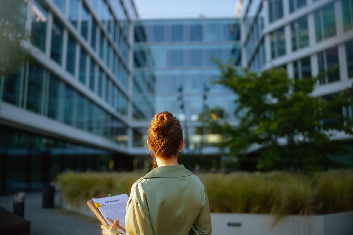 woman-standing-outside-building